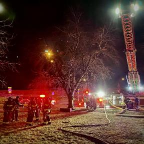 Boulder Fire-Rescue Engine and Firefighters at the scene of a structure fire on Thunderbird Drive