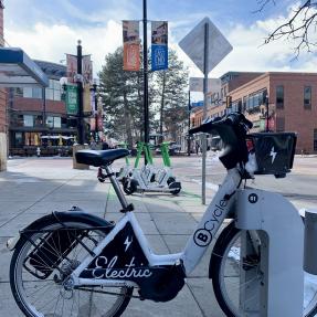 B-cycle and Lime scooters parked in downtown Boulder